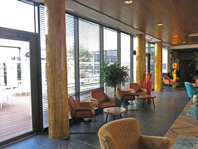 Columns imtation tree trunk for a lobby of Kopster Hotel in Lyon