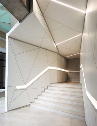 © www.hasap.fr origami-inspired corridor in mono acoustic ceiling in Implid by Rouveure Marquez