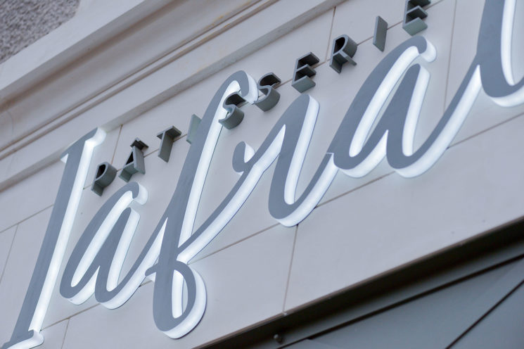 Sign on the new façade of the Ifrati pastry shop