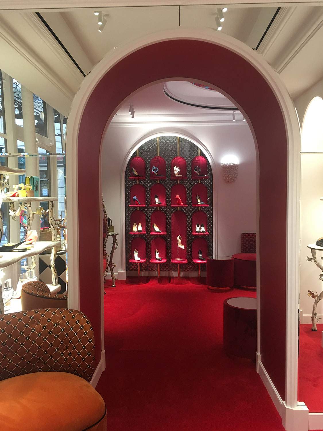Arch made of fibrous plaster in the Louboutin women's boutique in Paris